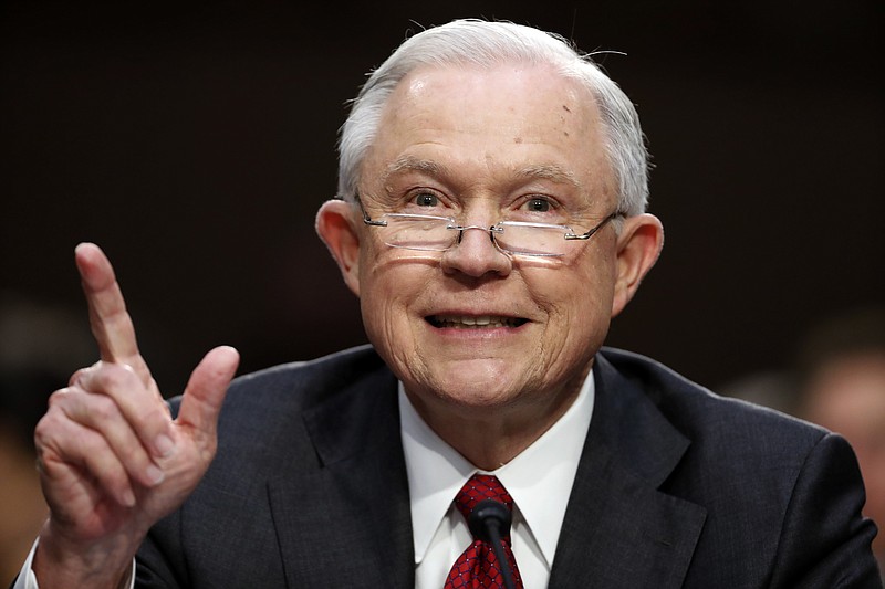 
              FILE - In this June 13, 2017, file photo, Attorney General Jeff Sessions speaks on Capitol Hill in Washington, as he testifies before the Senate Intelligence Committee hearing about his role in the firing of James Comey, his Russian contacts during the campaign and his decision to recuse from an investigation into possible ties between Moscow and associates of President Donald Trump. Trump’s withering invective about Sessions over the last week suggests an effort to pressure the attorney general into resigning with a possible eye toward replacing him and ending the Justice Department investigation into Russian meddling in the 2016 election.(AP Photo/Alex Brandon, File)
            