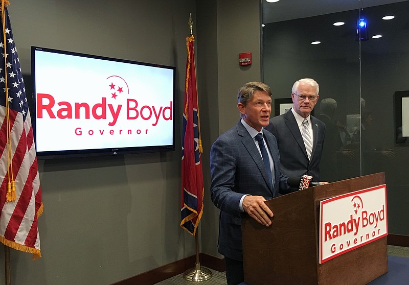 
              Tennessee gubernatorial candidate Randy Boyd, at podium, speaks to reporters as Shelby County Mayor Mark Luttrell, right, listens Wednesday, July 26, 2017, in Memphis, Tenn. Luttrell endorsed Boyd, a fellow Republican, in the 2018 Tennessee governor's race. (AP Photo/Adrian Sainz)
            