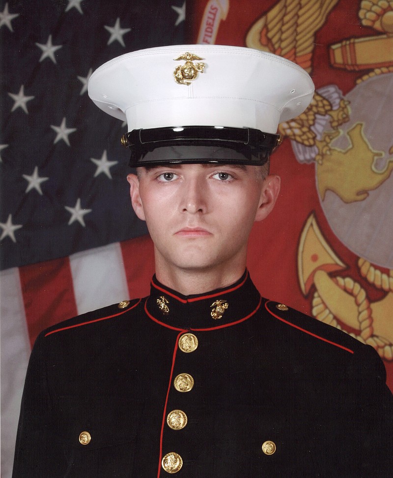 
              In this undated photo provided by David Taylor Sr., former Marine David Taylor poses for an official portrait while in the Marine Corps. David Taylor Sr. told The Associated Press on Tuesday, July 25, 2017, that he was notified by the U.S. State Department that his son was killed earlier this month in Syria while fighting for a Kurdish militia battling the Islamic State group. (U.S. Marine Corps/David Taylor Sr. AP)
            