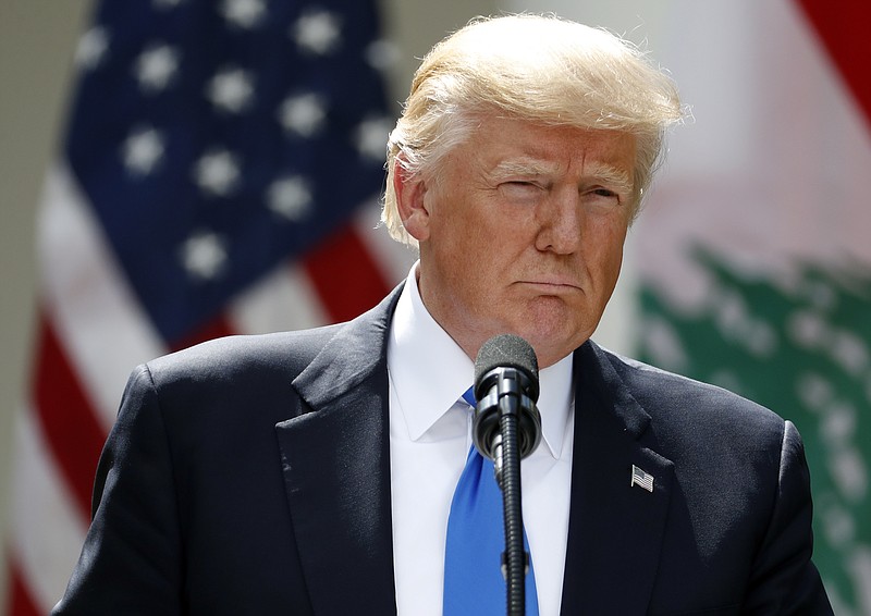 
              President Donald Trump listens to a question during a joint news conference with Lebanese Prime Minister Saad Hariri in the Rose Garden of the White House in Washington, Tuesday, July 25, 2017. (AP Photo/Alex Brandon)
            