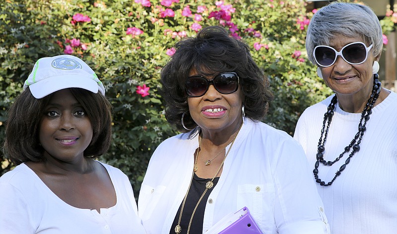 Miranda Sims, left, Gloria McClendon and Isabella Lane pose outside of the Eastdale Recreation Center on Tuesday, July 11, in Chattanooga, Tenn. Sims is the assistant secretary for the Foxwood Heights Neighborhood Association, McClendon is the president and Lane is the vice president.