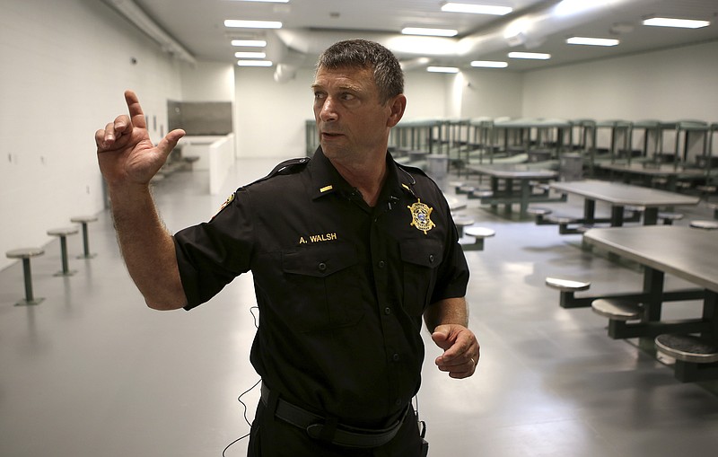 Lt. Allan Walsh, superintendent of the Bradley County Sheriff's Office work release program, gives a tour of the new Brian K. Smith Inmate Workhouse on Thursday, July 27, in Cleveland, Tenn.