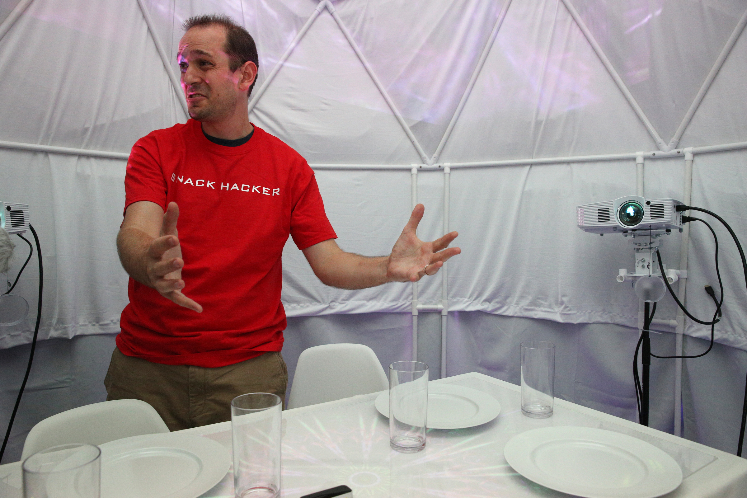 Sam Pfister, an experience designer at Sue's Tech Kitchen in the Tomorrow Building in Chattanooga, Tenn., describes one of the experience rooms Thursday, July 27, 2017. The different rooms include the
