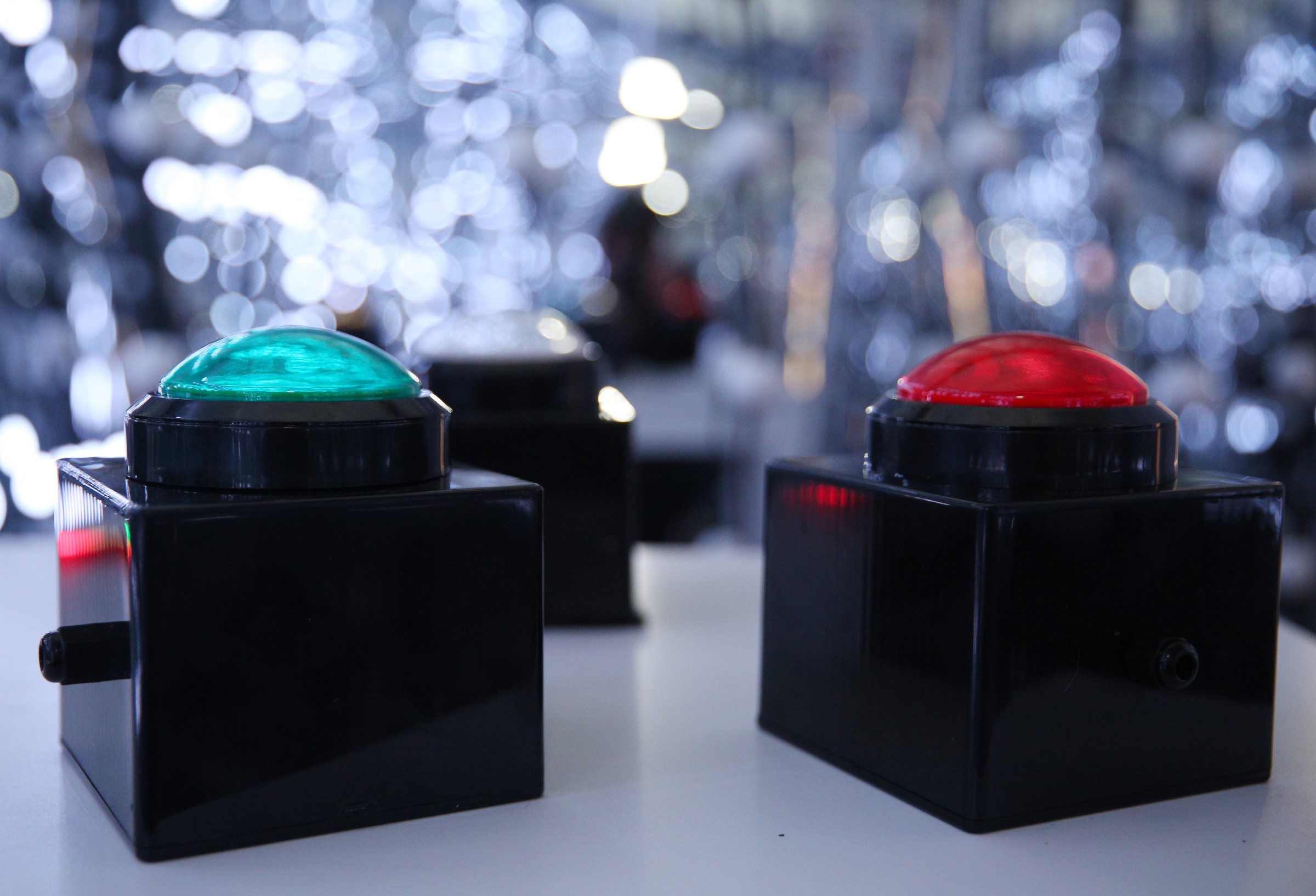 Buttons sit out in the experience room called Ҵhe infinite dimension of gumballsӠat Sue's Tech Kitchen in the Tomorrow Building in Chattanooga, Tenn., Thursday, July 27, 2017. The room gives families the opportunity to compete in an interactive game for a bag of gumballs.