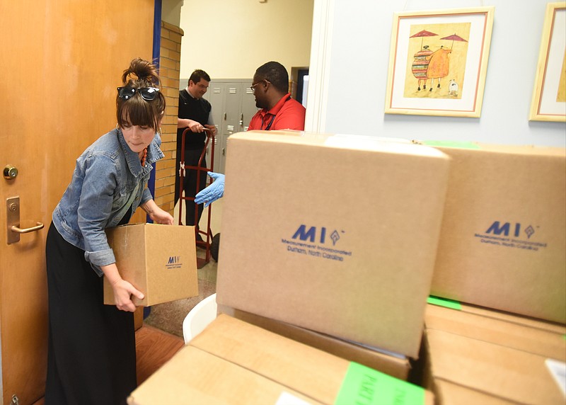 Boxes of TNReady state assessment test materials are stacked at Normal Park Upper School in 2016.