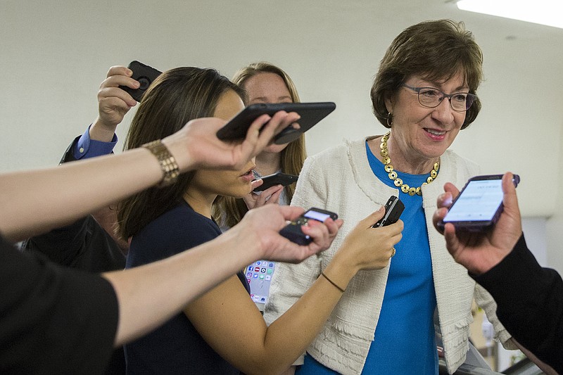 Sen. Susan Collins (R-Maine) speaks to reporters. (Tom Brenner/The New York Times)