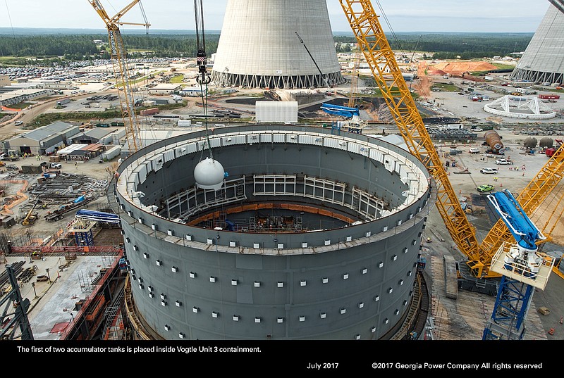 The first of two accumulator tanks is palced inside of the containment building being erected at Plant Vogtle near Waynesboro, Ga.