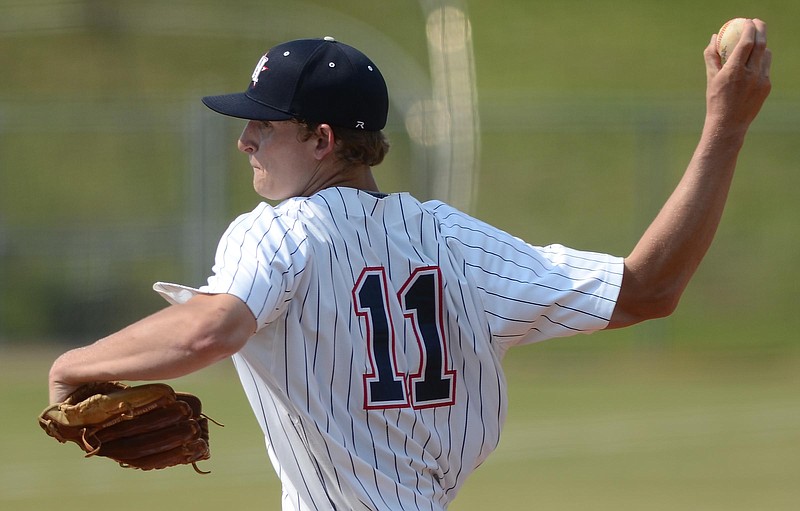 Staff Photo by Robin Rudd Cole Wilcox (11) pitches for Heritage. The Hardaway Hawks visited the Heritage General in GHSA state baseball tournament action on May 10, 2017.