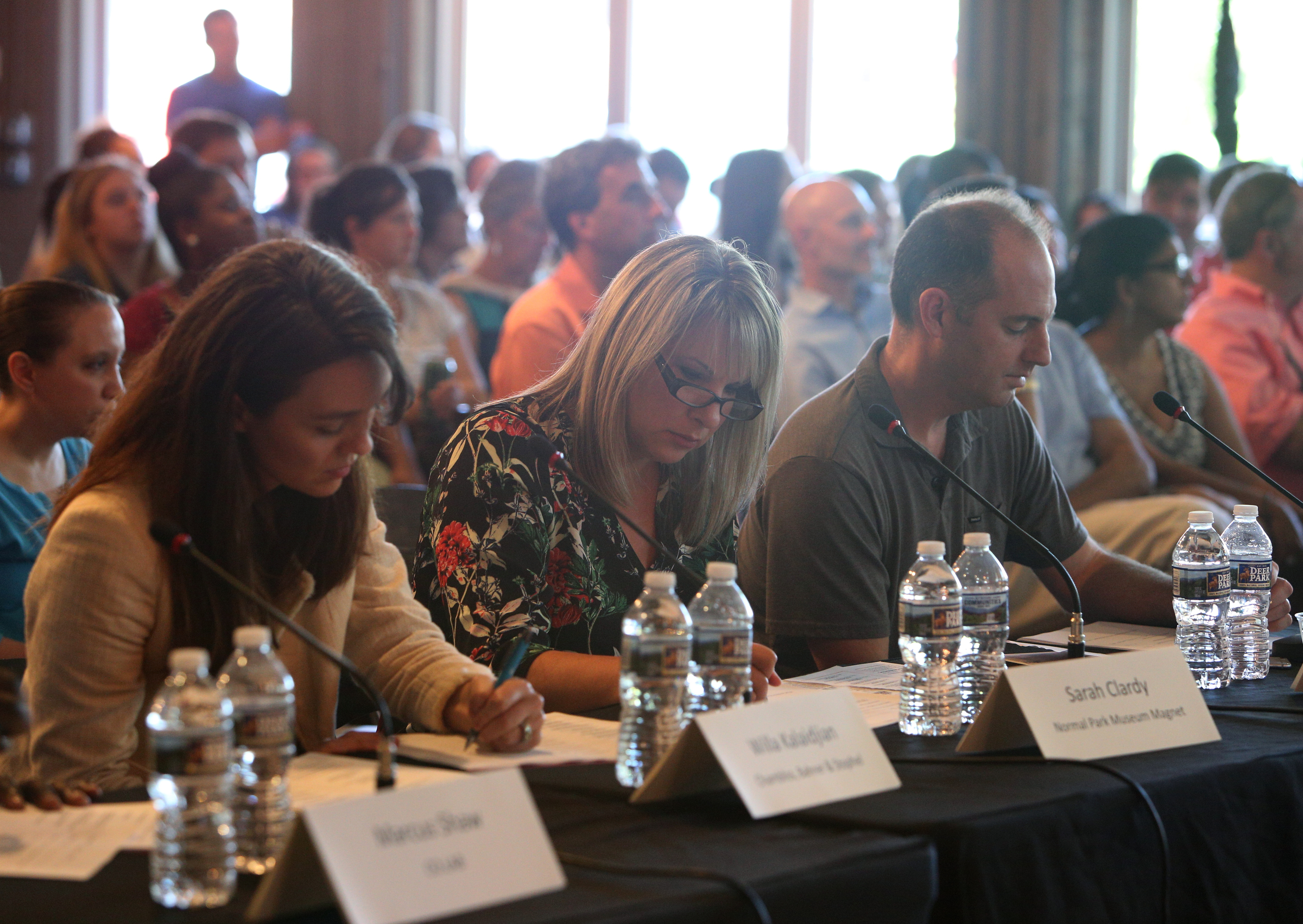 Judges Willa Kalaidjian, Sarah Clardy and Jonathan Bragdon take notes on presentations Sunday, July 30, 2017, during Pitch Night for the Teacherpreneur Incubator at Granfalloon in Chattanooga, Tenn. The Teacherpreneur Incubator offers teachers support, time and space to come up with ideas for their classrooms and execute those ideas.