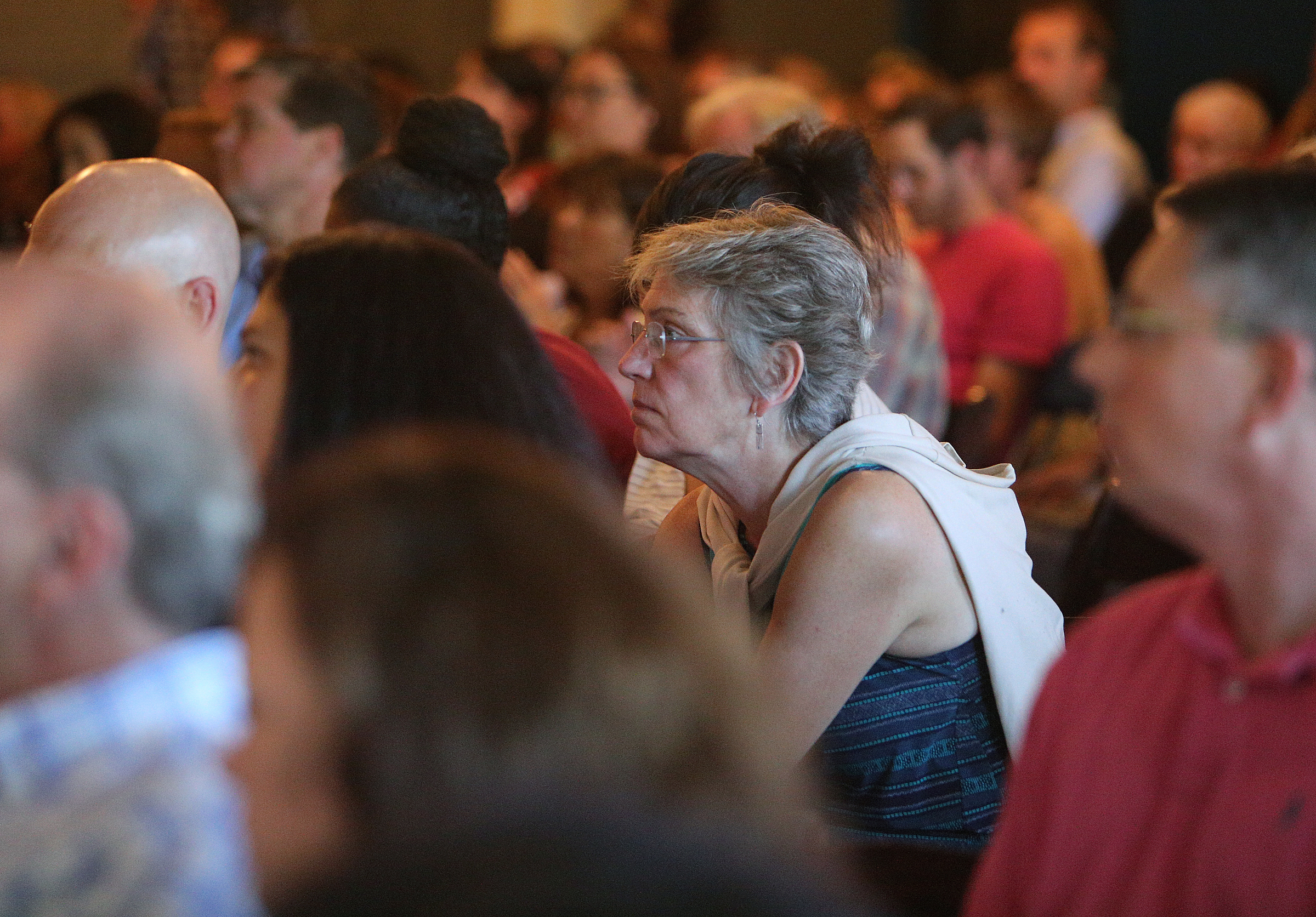 Ann Coulter listens to presentations Sunday, July 30, 2017, during Pitch Night for the Teacherpreneur Incubator at Granfalloon in Chattanooga, Tenn. Coulter came to the event last year and wanted to see what teachers thought up this time around.