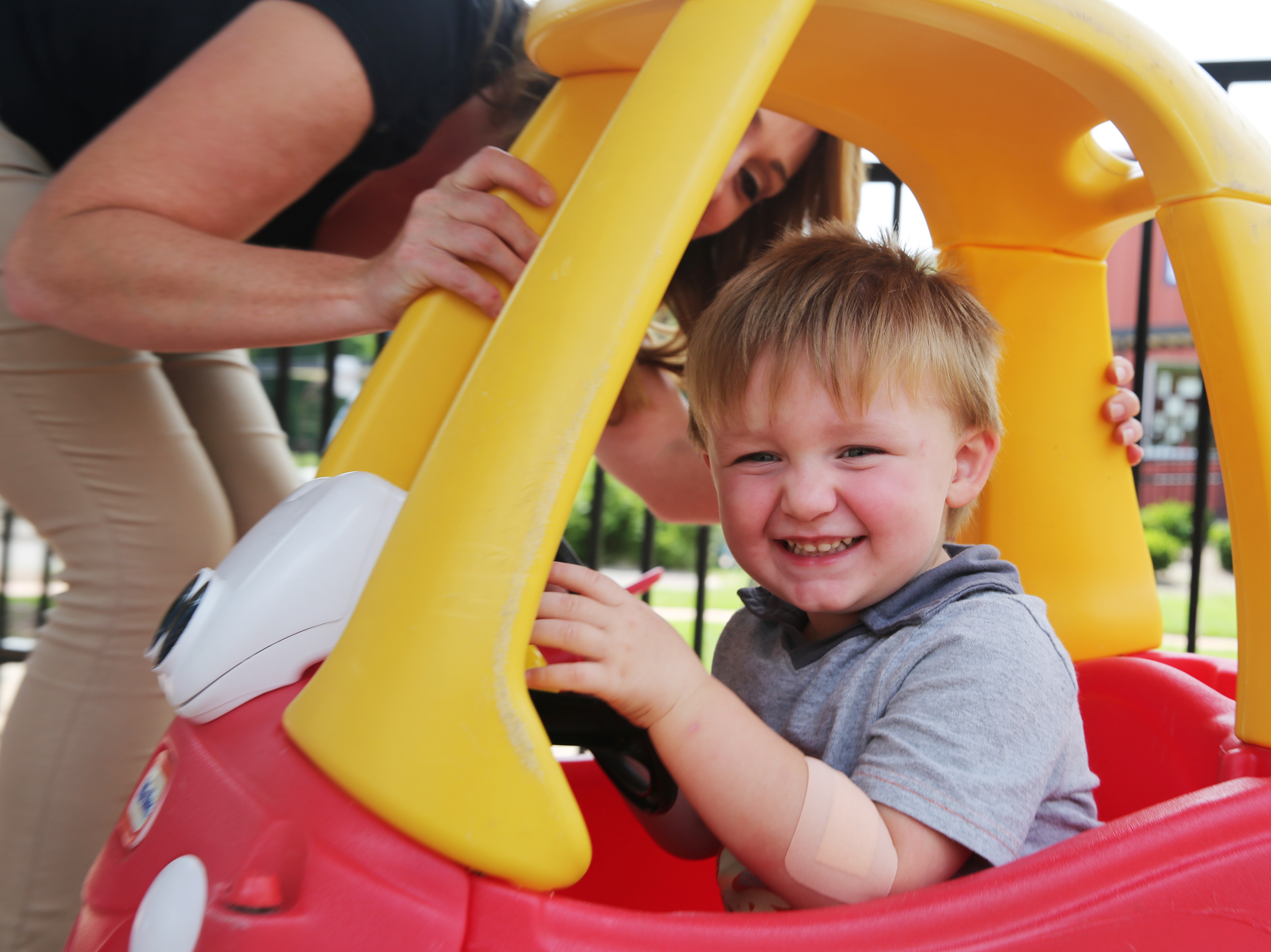Mason Snider, 2, laughs as his mom Amanda Smothers plays with him at Signal Centers Monday, July 31, 2017, in Chattanooga, Tenn. Smothers enrolled her family in Baby University, and through Purposity, she will be receiving diapers for her son.