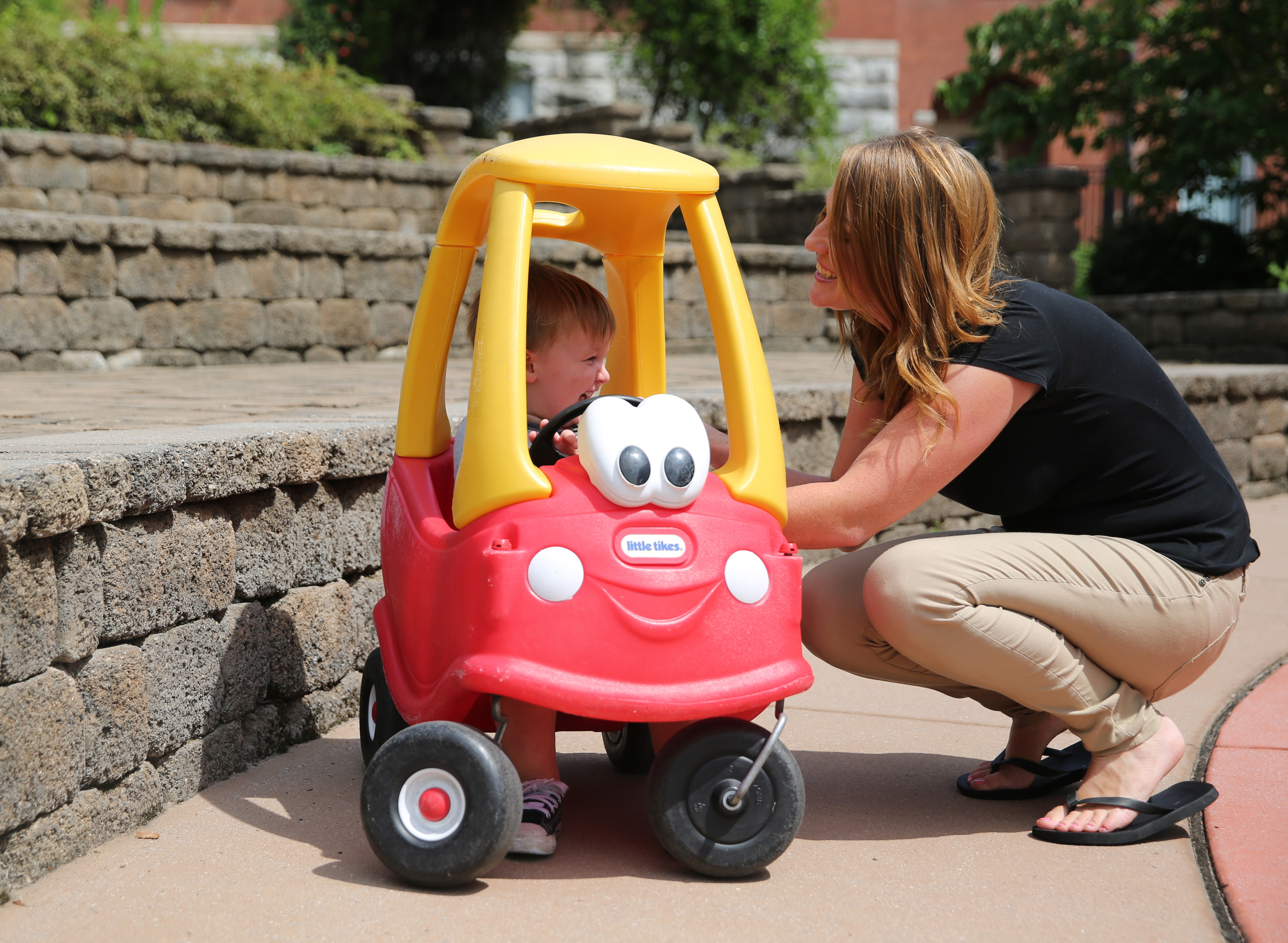 Mason Snider, 2, plays with his mom Amanda Smothers at Signal Centers Monday, July 31, 2017, in Chattanooga, Tenn. Smothers is a single mom that moved to Chattanooga to escape domestic violence.