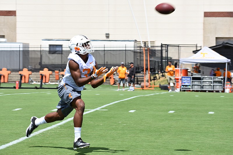 Freshman running back Ty Chandler catches a punt during Tennessee's first preseason practice on July 29 at Haslam Field.
