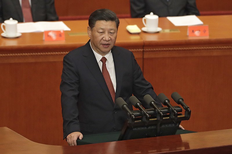 
              Chinese President Xi Jinping speaks during a ceremony to commemorate the 90th anniversary of the founding of the People's Liberation Army at the Great Hall of the People in Beijing, Tuesday, Aug. 1, 2017. (AP Photo/Andy Wong, Pool)
            