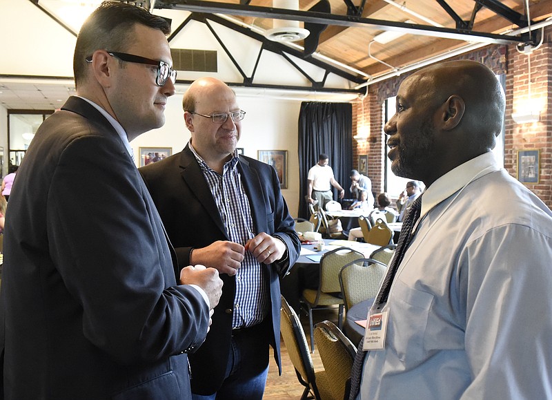 From left, Jonas Barriere UnifiED Executive Director, David Eichenthal UnifiEd Board Member, listen to Dr. John Marshall chief equity officer for Jefferson County, Kentucky Public Schools before Mr. Marshall's presentation. UnifiED launched APEX, an Action Plan for Educational Excellence at the Bessie Smith Cultural Center on Aug. 1, 2017.