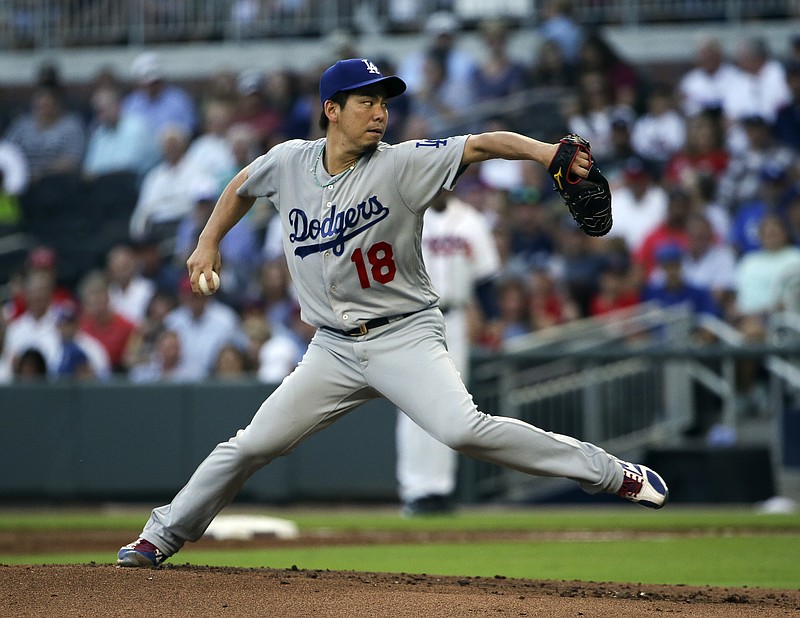 Los Angeles Dodgers starting pitcher Kenta Maeda (18) works against the Atlanta Braves in the first inning of a baseball game Tuesday, Aug. 1, 2017, in Atlanta. (AP Photo/John Bazemore)