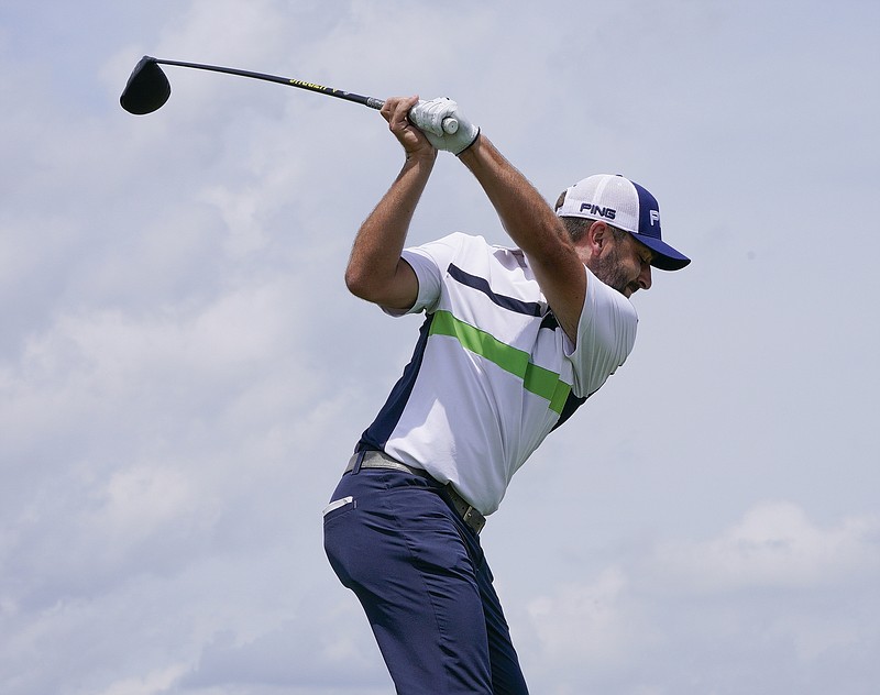 AP photo by Morry Gash / Stephan Jaeger hits on the 10th tee during a practice round for the U.S. Open on June 14, 2017, inErin, Wis.