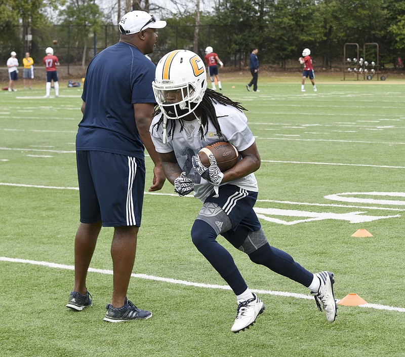 UTC senior Richardre Bagley, with ball, is just one of the talented options the Mocs have at running back this season.