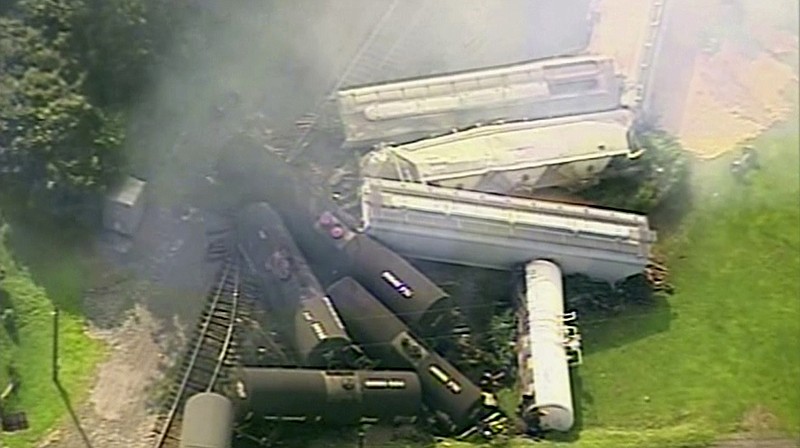 
              In this aerial image made from a video provided by WPXI, smoke rises in the air after dozens of cars of a freight train carrying hazardous materials derailed in Hyndman, Pa., Wednesday, Aug. 2, 2017. County officials ordered all residents of the small Pennsylvania town to evacuate after the derailment. (WPXI via AP)
            