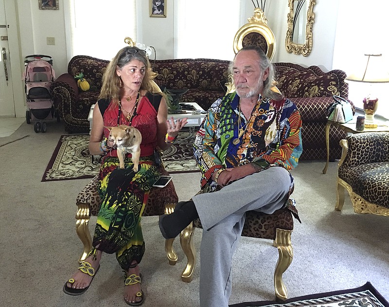
              Heidi and Charles Edward Lepp sit in their Sacramento, Calif., home Tuesday, Aug. 1, 2017, discussing a shooting at the cannabis farm affiliated with their Rastafarian church in Dobbins, Calif., earlier in the day. Heidi Lepp received a call Tuesday morning that a worker at the Northern California farm was pulling up plants and was armed, prompting her to call the Yuba County Sheriff's Department. (AP Photo/Kathleen Ronayne)
            