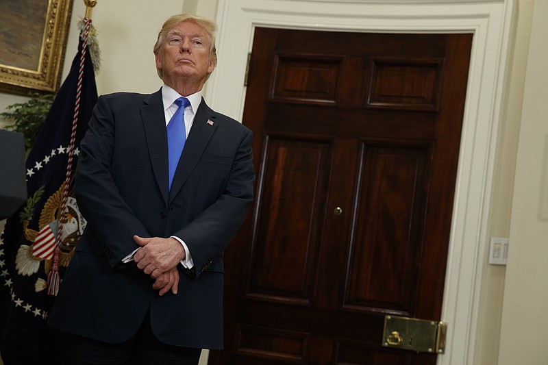 President Donald Trump stands in the Roosevelt Room of the White House in Washington last week. (AP Photo/Evan Vucci)