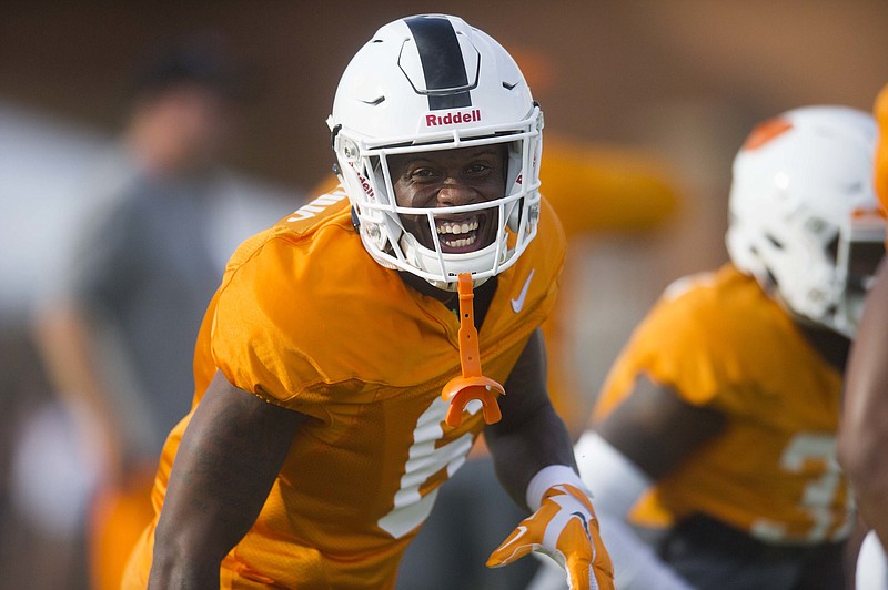 Tennessee defensive back Shaq Wiggins (6) smiles while warming up during NCAA college football practice in Knoxville, Tenn., Tuesday, Aug. 1, 2017. (Caitie McMekinKnoxville News Sentinel via AP)