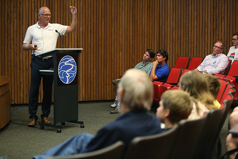 Dr. Andreas Fath, a world-record-holding endurance swimmer and scientist, gives a presentation about some of his findings from swimming the Tennessee River Thursday, Aug. 3, 2017, at the Tennessee Aquarium in Chattanooga, Tenn. Fath and his team are measuring various pollutants and pharmaceuticals in the river as well as the about of micro-plastics flowing downstream. 