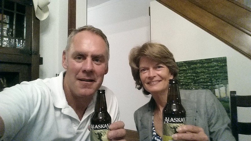 
              In this photo provided by the office of Interior Secretary Ryan Zinke, taken, Wednesday, Aug. 2, 2017, Zinke and Sen. Lisa Murkowski, R-Alaska enjoy Alaskan beer in Washington. Zinke says he’s mended fences with Murkowski after a widely reported dispute over Murkowski’s vote to oppose the GOP health care bill. Zinke tweeted a photo of the two enjoying the beers at his Washington home. (Office of Interior Secretary Ryan Zinke via AP)
            