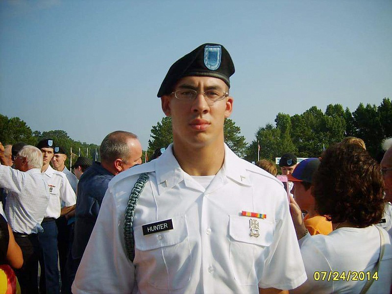 
              In this July 24, 2014, photo provided by Leah Marche, her cousin Mark Hunter's son Jonathan Hunter poses for a photo at a graduation ceremony at Fort Benning, Ga. Jonathan Hunter, an Indiana soldier who was just 32 days into his first deployment, was one of two American service members killed in a suicide bombing attack in Afghanistan, his father said Thursday, Aug. 3, 2017. (Mark Hunter via AP)
            