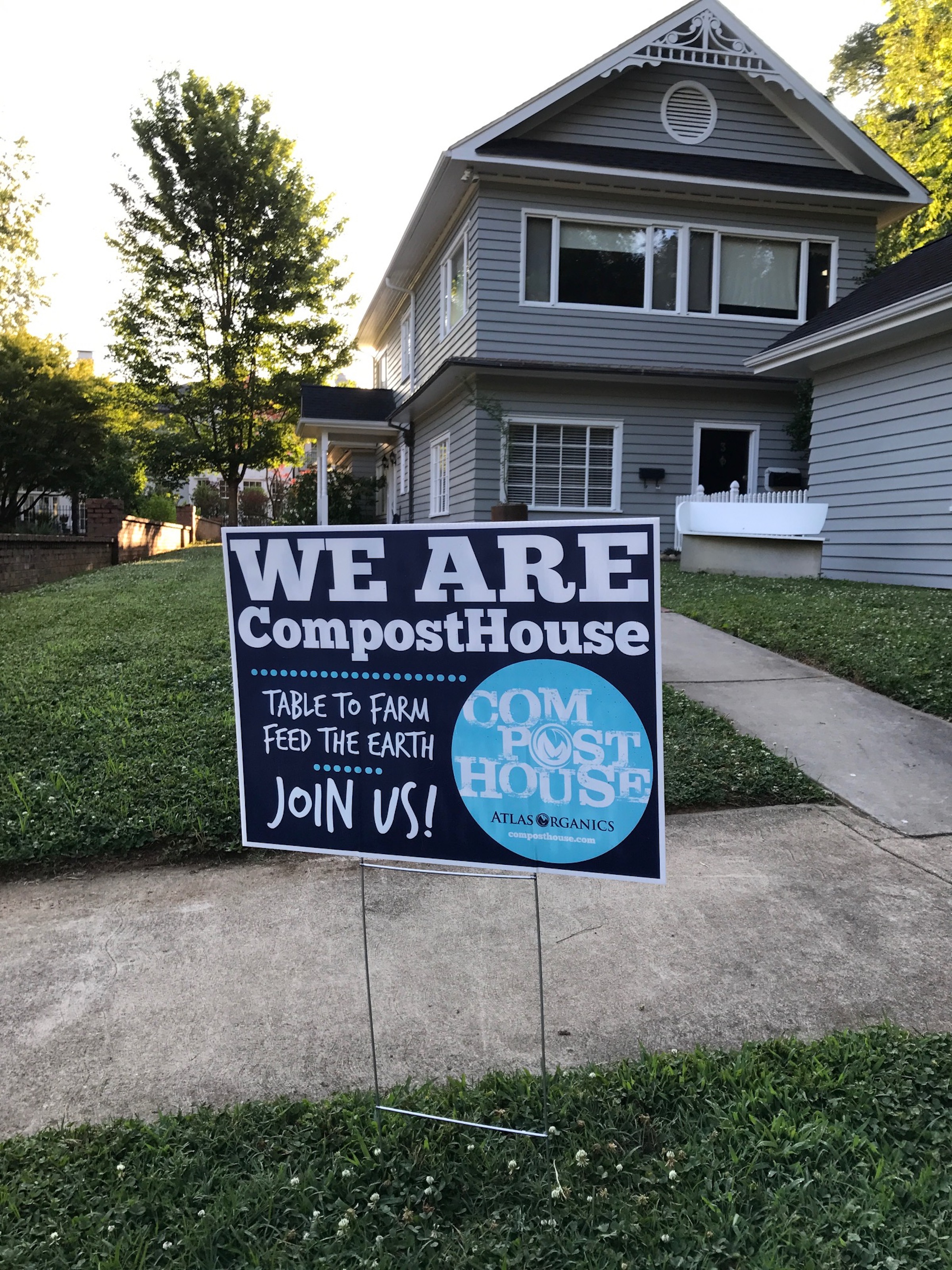A yard sign in South Carolina designating a participant in the Compost House program.