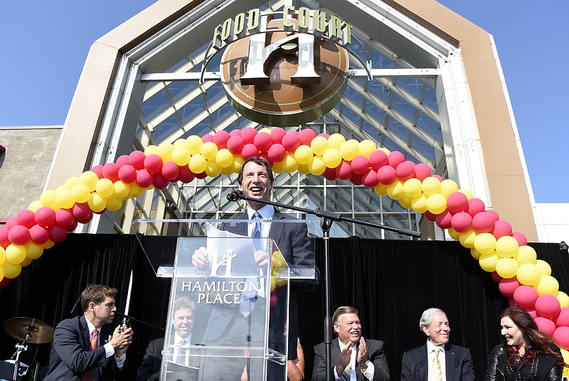 CBL President and CEO Stephen Lebovitz introduces pop-star Tiffany, far right.  Also present of the stage, from left are Congressman Chuck Fleischmann, Chattanooga Mayor Andy Berke, Hamilton Place Marketing Director Kim Lyons (obscured), Hamilton County Mayor Jim Coppinger, and CBL Chairman Charles B. Lebovitz.  The 30th year anniversary of the opening of Hamilton Place Mall was celebrated on August 4, 2017.    