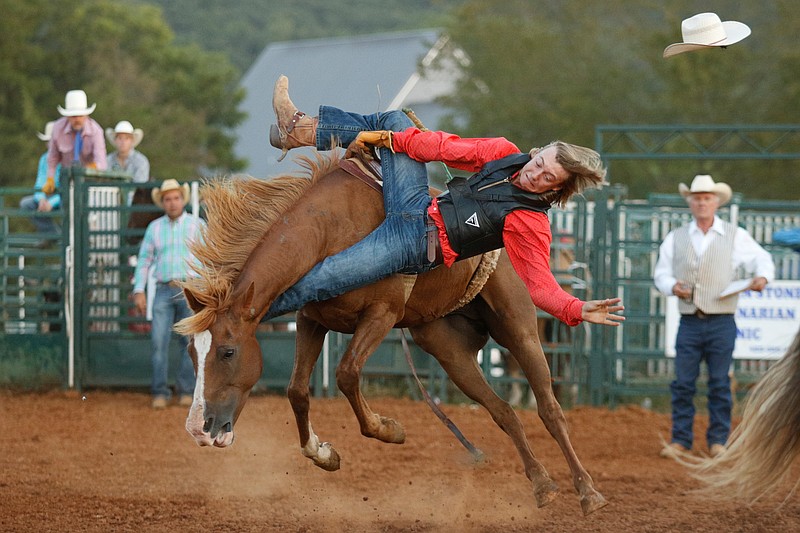 Mathis Colby competes in bareback bronco riding at the 20th annual St. Jude Rodeo at Doug Yates Farm on Saturday, Aug. 5, 2017, in Ringgold, Ga. The event benefitting St. Jude Children's Research Hospital features bull riding, calf roping, bronco busting, and more.