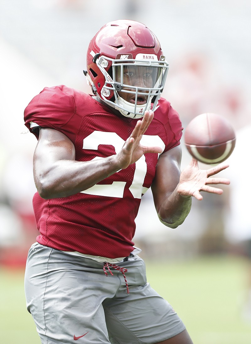 Alabama senior inside linebacker Shaun Dion Hamilton goes through a pass-catching drill during a recent practice in Tuscaloosa.