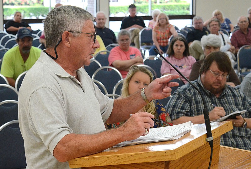 Chattooga County resident Adam Baggett makes a point during the comment segment of the meeting.  Chattooga County Commissioner Jason Winters held a hearing to announce a property tax increase and ask for citizen's input on August 7, 2017 at the Chattooga County Civic Center in Summerville.