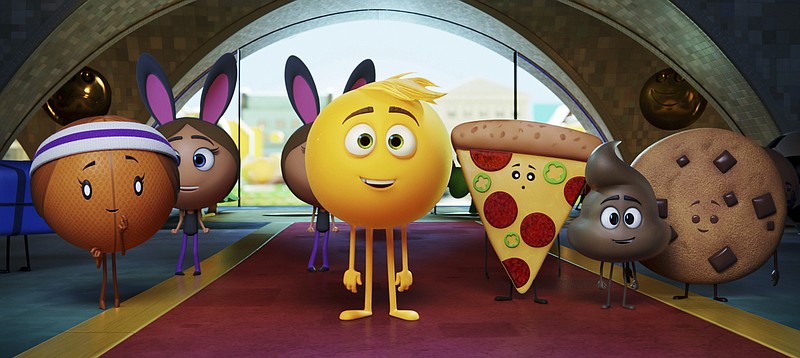 This image released by Sony Pictures shows Gene, voiced by T.J. Miller, center, in Columbia Pictures and Sony Pictures Animation's "The Emoji Movie." (Sony Pictures Animation via AP)