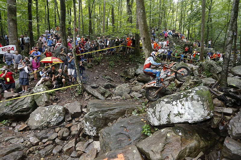 The course challenges riders with boulders, rock-littered paths, fallen logs and other natural obstacles.