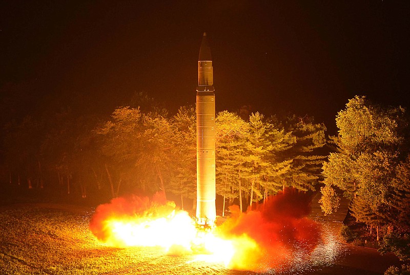 In this July 28, 2017, file photo distributed by the North Korean government, shows what was said to be the launch of a Hwasong-14 intercontinental ballistic missile at an undisclosed location in North Korea. North Korea was the main concern cited in the "white paper" approved by Japan's Cabinet on Tuesday, Aug. 8, 2017, less than two weeks after the North test-fired its second ICBM. Independent journalists were not given access to cover the event depicted in this image distributed by the Korean Central News Agency via Korea News Service. (Korean Central News Agency/Korea News Service via AP, File)