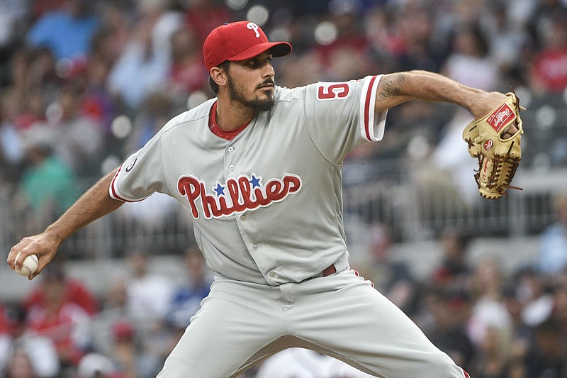 Philadelphia Phillies' Zach Eflin pitches during the first inning of a baseball game against the Atlanta Braves, Tuesday, Aug. 8, 2017, in Atlanta. (AP Photo/John Amis)