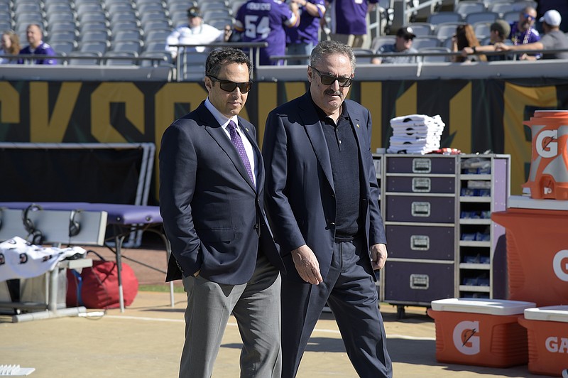 
              FILE - In this Dec. 11, 2016, file photo, Minnesota Vikings owners Mark Wilf, left, and Zygi Wilf watch warmups on the sideline before an NFL football game between the Vikings and Jacksonville Jaguars in Jacksonville, Fla. The majority owners of the Vikings are joining a group trying to bring a Major League Soccer expansion franchise to Nashville. Mark, Zygi and Leonard Wilf are minority owners in the Nashville project, according to Nashville Soccer Holdings CEO John R. Ingram. Terms of the Wilfs' investment haven't been disclosed. (AP Photo/Phelan M. Ebenhack, File)
            