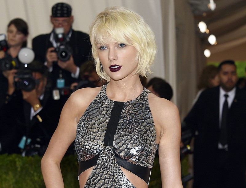 In this May 2, 2016, file photo, Taylor Swift arrives at The Metropolitan Museum of Art Costume Institute Benefit Gala in New York. The trial of a lawsuit between Swift and David Mueller, a former radio host she accuses of groping her, begins Monday, Aug. 7, 2017, in U.S. District Court in Denver. (Photo by Evan Agostini/Invision/AP, File)