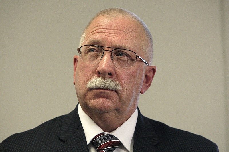 
              FILE In this Aug. 19, 2010, file photo, Arizona Department of Corrections Director Charles Ryan listens during a news conference in Phoenix, Ariz. Ryan was grilled by a Phoenix judge Tuesday, Aug. 8, 2017, over whether he tried to undermine a court order that prohibited retaliation against inmates who participated in a class-action lawsuit over the quality of health care in the state's prisons. (AP Photo/Ross D. Franklin, file)
            