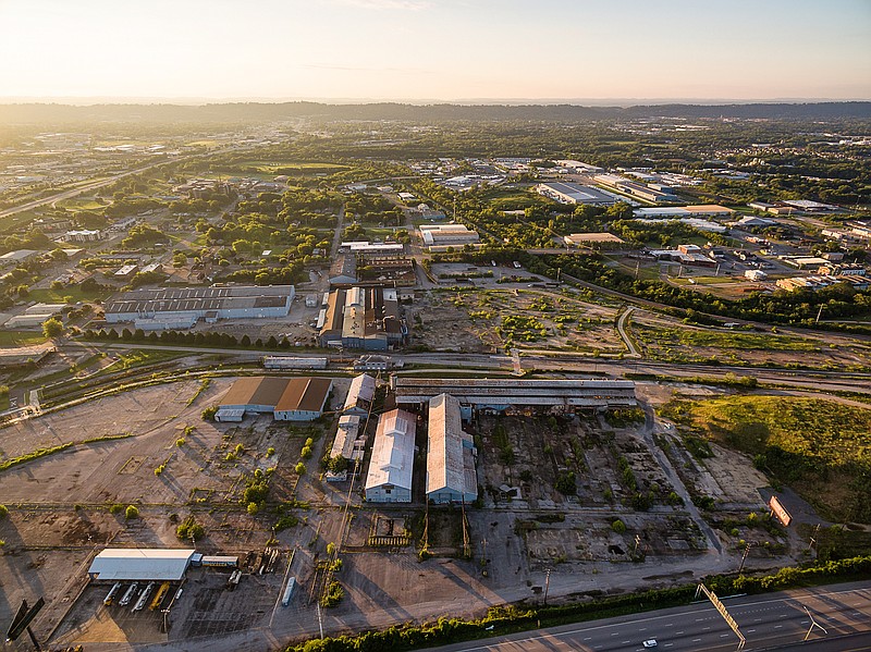 This aerial view of the South Broad District shows the large Wheland/U.S. Pipe site in the foreground and is looking east toward The Howard School.