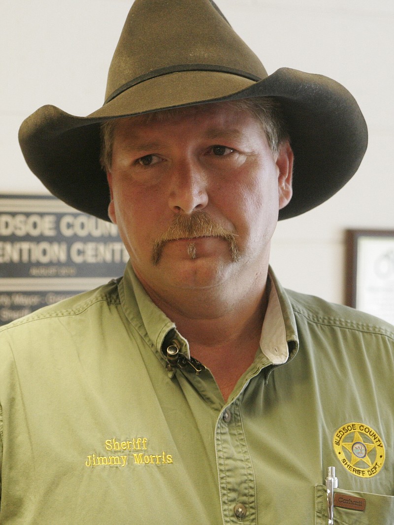 Staff Photo by Patrick Smith/Chattanooga Times Free Press - Aug 25, 2011 - Bledsoe County Sheriff Jimmy Morris speaks to members of the media during a news conference Thursday. Authorities arrested Brenda K. Brown, 47, of Pikeville, in the slayings of sisters Elizabeth Brown, 82, and Billie Sue Blaylock, 79, investigators said.