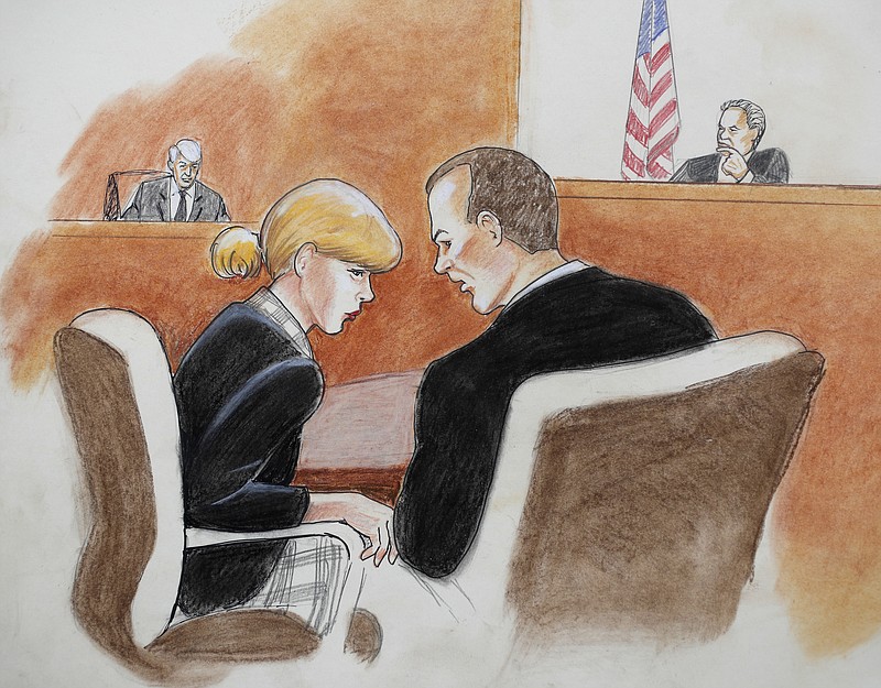 
              In this courtroom sketch, pop singer Taylor Swift, front left, confers with her attorney as David Mueller, back left, and the judge look on during a civil trial in federal court Tuesday, Aug. 8, 2017, in Denver. Mueller, a former radio disc jockey accused of groping Swift before a concert testified Tuesday that he may have touched the pop superstar's ribs with a closed hand as he tried to jump into a photo with her but insisted he did not touch her backside as she claims. (Jeff Kandyba via AP)
            