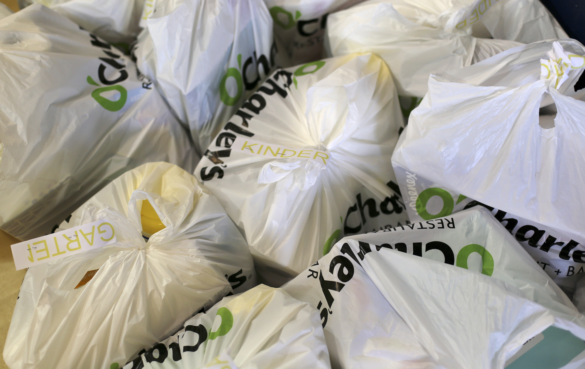 Bags of supplies for kindergarteners are seen at Roan School on Wednesday, Aug. 2, in Dalton, Ga. Roan School, a low-income school, held their orientation on Wednesday and school supplies that were collected and donated by Rock Bridge Community Church were passed out.
