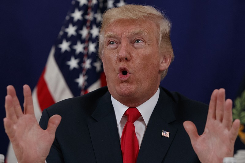 
              President Donald Trump speaks to reporters after a security briefing at Trump National Golf Club in Bedminster, N.J., Thursday, Aug. 10, 2017. (AP Photo/Evan Vucci)
            