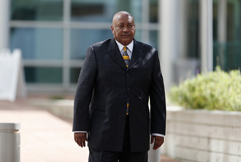 Greg Dent, former security guard for pop singer Taylor Swift, emerges from the federal courthouse after testifying in the civil trial for the pop singer, Friday, Aug. 11, 2017, in Denver. Radio station DJ David Mueller sued Swift after her team reported she was groped by Mueller to his bosses at a country music station. He is seeking up to $3 million, saying the allegation cost him his job and reputation. Swift countersued Mueller, claiming sexual assault. She is seeking a symbolic $1.