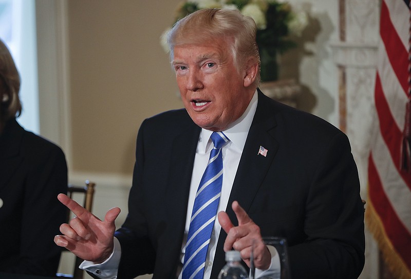 President Donald Trump gestures as he answers a question regarding the ongoing situation in North Korea, Friday, Aug. 11, 2017, at Trump National Golf Club in Bedminster, N.J. (AP Photo/Pablo Martinez Monsivais)