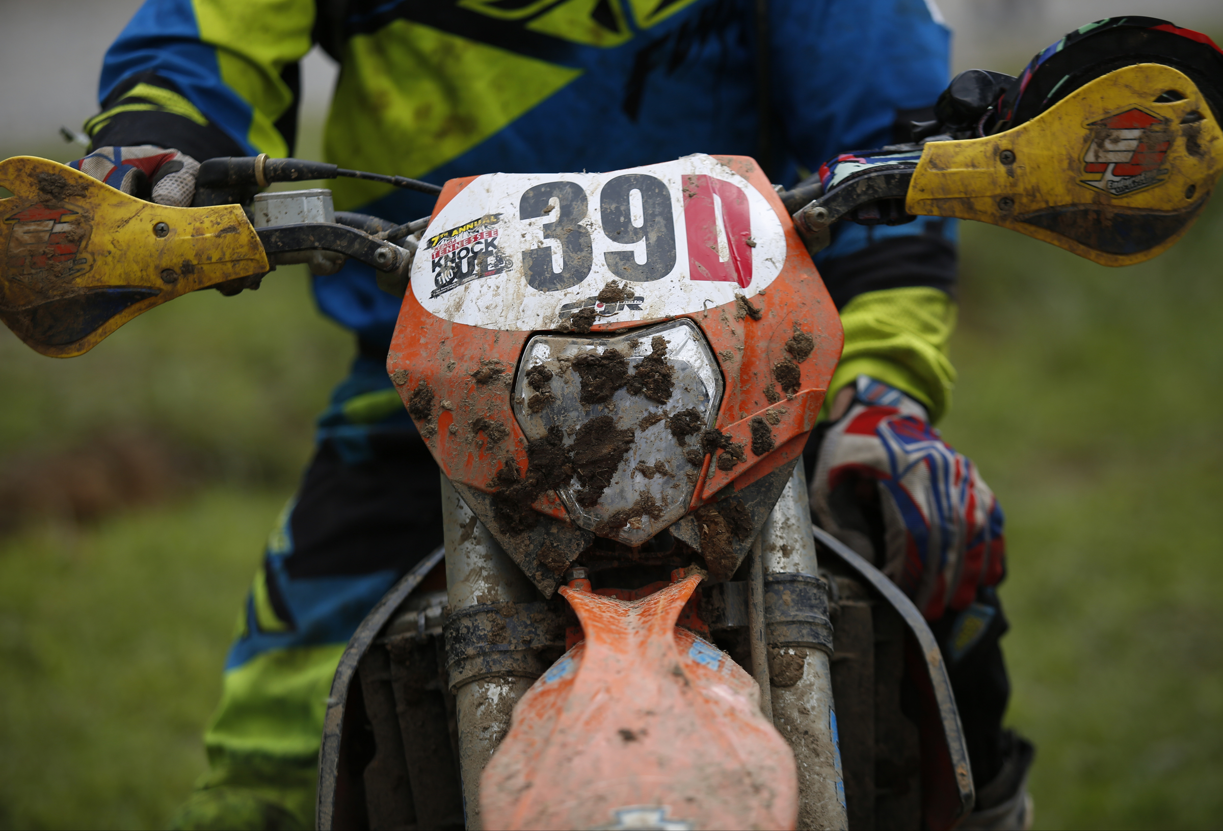 Troy Desimone's bike is coated with mud before competing in the Kenda AMA Tennessee Knockout Extreme Enduro road race amateur qualifier at Trials Training Center on Saturday, Aug. 12, 2017, in Sequatchie, Tenn. The top 30 qualifiers in Saturdays races will compete alongside professionals on Sunday.