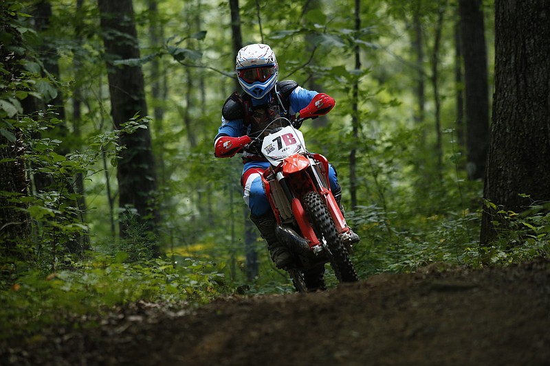Ryan Benfield competes in the Kenda AMA Tennessee Knockout Extreme Enduro road race amateur qualifier at Trials Training Center on Saturday, Aug. 12, 2017, in Sequatchie, Tenn. The top 30 qualifiers in Saturdays races will compete alongside professionals on Sunday.